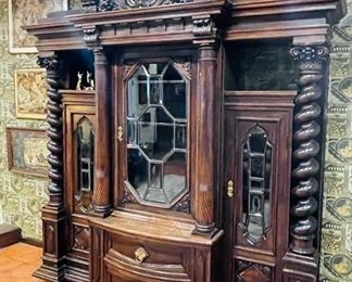#31 - $1,975 Large Continental oak cabinet with lead glass doors and side storage • 94high 97wide 26deep