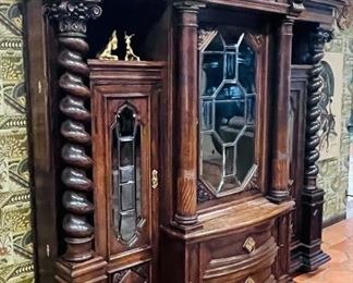 #31 - $1,975 Large Continental oak cabinet with lead glass doors and side storage • 94high 97wide 26deep