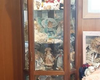 Many dolls & Display case
