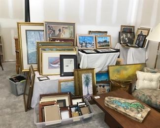Lots of picture frames and framed art