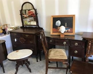 Antique desk with glass top, measures 42” x 18” x 29” $175.