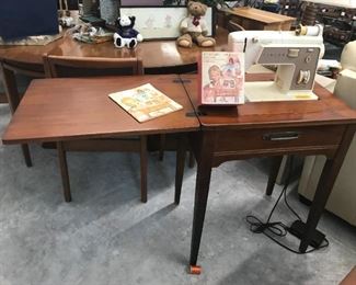 Singer sewing machine & cabinet $80