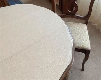 Custom table pad included with table 