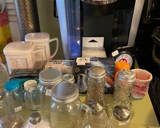 Keurig touchscreen and lots of S&P sets