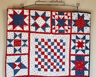 Small quilt on sewing machine hanger