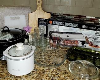 Crock pots, cutting boards & B & D food sealer etc.