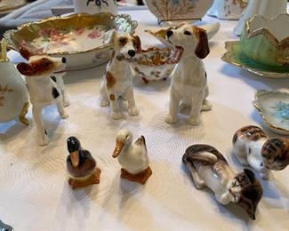 Royal Doulton dogs (the one on the left has cracks), ducks, cats