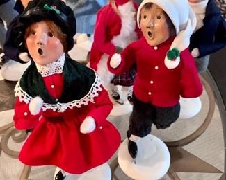 There are several (on the white bases) that are signed & numbered.