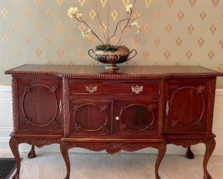 $450; vintage mahogany buffet with beautiful carvings and doors; 71w x 23d x 39h. Some condition issues on the top. Detailed images avail upon request 
