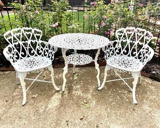 SOLD $250; 2 of these available; set of 3 pieces; white, wrought iron 2 chairs and table; perfect for cocktails or dinner for two; chairs 23w x 20d x 32h; table 31d x 27h