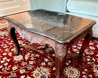 $280; two-piece marble top and wood carved table; 24w x 19d x 15.5h