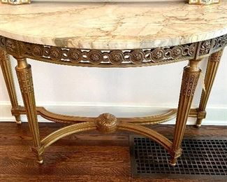 SOLD $1200; marble top table with gold gilded, carved style legs; 54x23.25x33.5