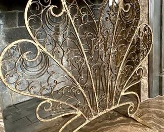 SOLD side view of ornate fireplace screen