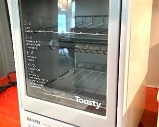 $80; Sanyo “Toasty” snack oven, model SK3G; 8”w x 10”d x 12”h