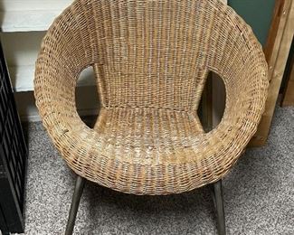 Unique wicker chair with metal legs