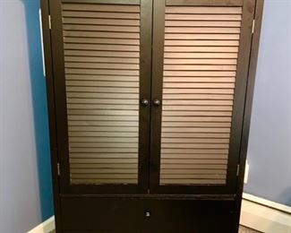 Black cabinet w/ 2 doors/shelves and 2 drawers