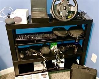 Electronics, Gaming wheel, keyboard, Bose headphones, Google Home Mini (2, one new in box), Aorus RGB Fan Commander, CD holder & CD's, Soundfreaq Bluetooth wireless speaker, etc.
