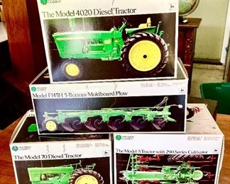 Vintage toy John Deere tractors and implements 