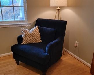 Blue upholstered chair is 38" high x 33" wide x 26" deep