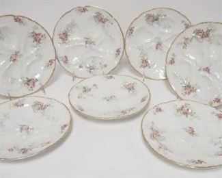 1006	7 GDA LIMOGES OYSTER PLATES, ROSE DECORATION W/GOLD BORDERS, 8 3/4 IN
