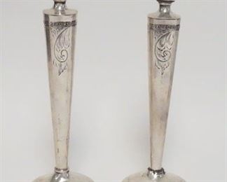 1019	PAIR OF WEIGHTED STERLING SILVER CANDLESTICKS, BOBACHES ALSO MARKED STERLING, SOME DENTING & TWISTING, 9 3/4 IN HIGH
