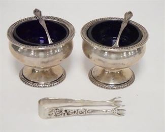 1024	STERLING SILVER LOT, 2 SALT DIPS W/BLUE GLASS LINERS, 2 SPOONS, & A SMALL PAIR OF TONGS, SILVER ONLY 4.835 TOZ
