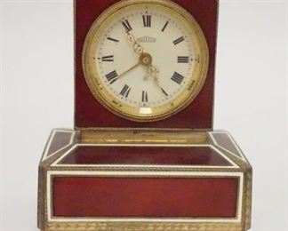 1058	ANGELUS ENAMELED CLOCK W/MUSIC BOX, MUSIC BOX NOT WORKING, 3 3/8 IN WIDE X 4 IN HIGH
