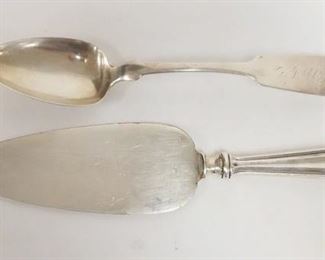 1073	2 PIECE COIN SILVER TABLESPOON SIGNED J WALLIN W/HALL MARKS & A PASTRY SERVER W/A STERLING SILVER HANDLE LONGEST IS 10 1/4 IN, 1.8 TOZ
