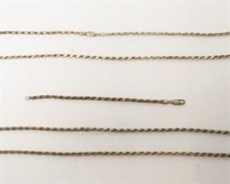 1167	2 STERLING SILVER BRAIDED NECKLACES WITH MATCHING BRACELET, MARKED 925 ITALY, 4.3 TOZ. NECKLACES ARE 28 AND 34 IN LONG, BRACELET IS 7 IN LONG
