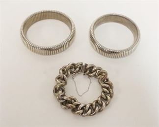 1192	3 BRACELETS, ONE MARKED EITHER 920 OR 820, 2 STRETCH BRACELETS WITH METAL CIRCLE INSIDE, MARK WORN OFF
