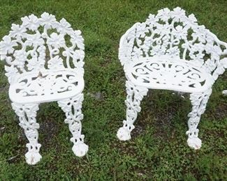 1212	PAIR OF ORNATE CAST IRON PATIO CHAIRS, ONE ARM CHAIR, 16 IN X 22 IN
