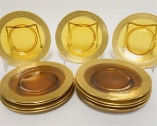 1306	SET OF 12 AMBER W/GOLD GLASS PLATES, POLISHED BASES, GOLD IS A FLOWER & LEAF PATTERN, 5 7/8 IN
