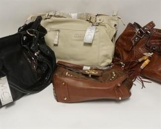 1342	LOT OF FOUR NEW PURSES NEVER USED
