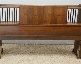 1355	MID CENTURY MODERN HEADBOARD W/ BOOKCASE BACK SLIDING DOORS 56 IN W. HAS STAIN ON TOP SURFACE
