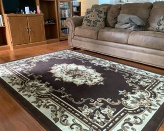 Beautiful floral 10’ x 16’ Brown and Beige Tone’s.  Excellent for any room.