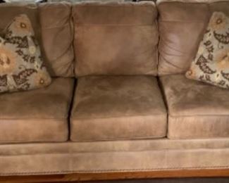 Like New three cushion roll arm squat wood feet sofa. Comfortable and soft to take a snooze, cozy up to a good book, or comfortable watch a great TV program.