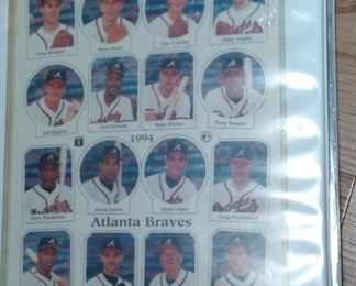 Binder with photos of entertainment and sports stars.  Front of binder is team photo of 1993 Braves.  Most are matted, ready to frame