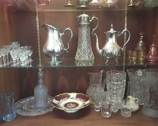 Selection of clear cordials, ases, and decanters.