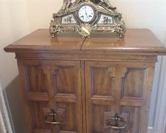 Small scale fold top bar with double doors and storage. French clock.