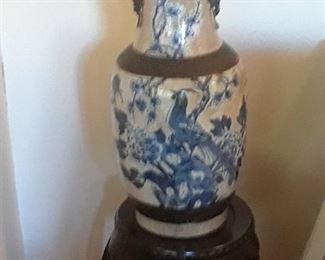 Crackle glaze vase with cobalt blue design. Japan. Shown on Chinese stool-shape stand. Priced separately.