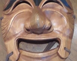 "Hahoetal" wood mask with hinged chin. Sometimes only the top half is worn.