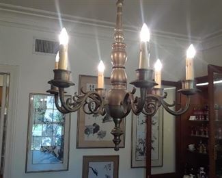 Burnished brass light fixture. Buyer must remove professionally.