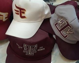 Texas A & M hats, jackets, and shirts.