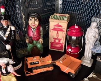 Coleman Vintage Red Lantern with Box, Tonka type metal spreader toy, Spanish man hinged wooden wine holder. 