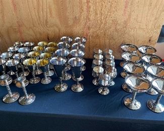 Silver chalices, silver goblets, silver punch bowl with 12 cups and Ladel, silver candle stick holders