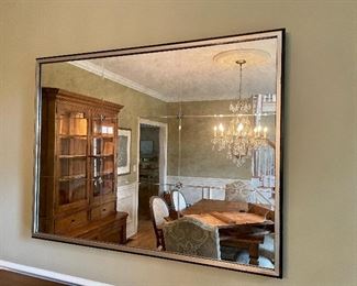 Ethan Allen Rosette Wall Mirror. A blend of old and new. Nine mirrors are antiqued by hand. They're framed in clean, contemporary solid wood, that's finished in an aged silver patina. Delicate star rosettes accent every panel of the center panel.  38" W x 50" h