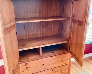 Vaughan Bassett Cottage Pine Armoire, a piece with wonderful style and a great amount of function. There are two doors, 2 drawers, 2 open compartments, adjustable shelving and the option of nesting a hidden television inside. (38" W x 18" D x 62.5" H)