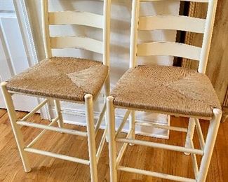 Two ladder back rush seat counter height stools from Saybrook Home