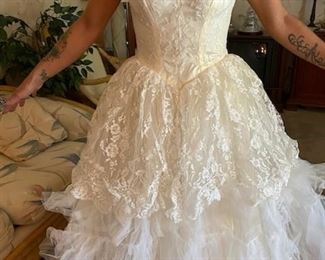 one of two vintage wedding dresses