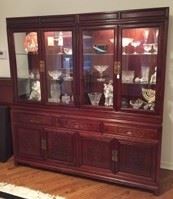 This is the display cabinet, lit in a couple of places to show off the collectibles found inside.